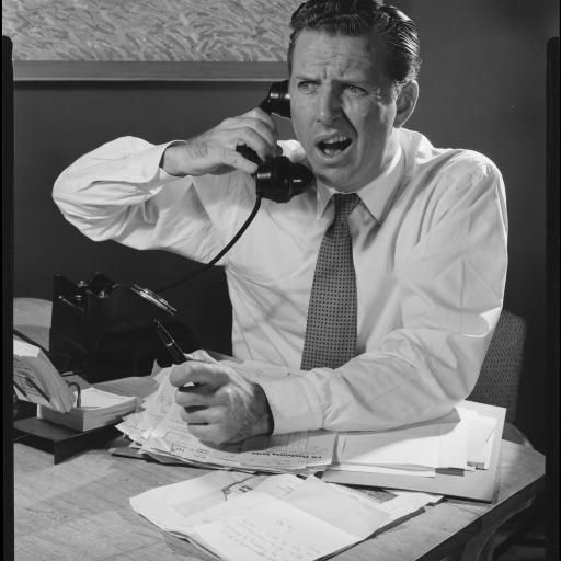 A person talking on a telephone